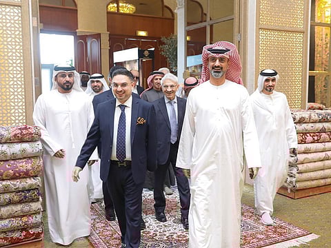 Shaikh Ammar Bin Humaid Al Nuaimi, Crown Prince of Ajman, visits the Culture of Woven Treasures museum for rare Persian carpets at Ajman Hotel