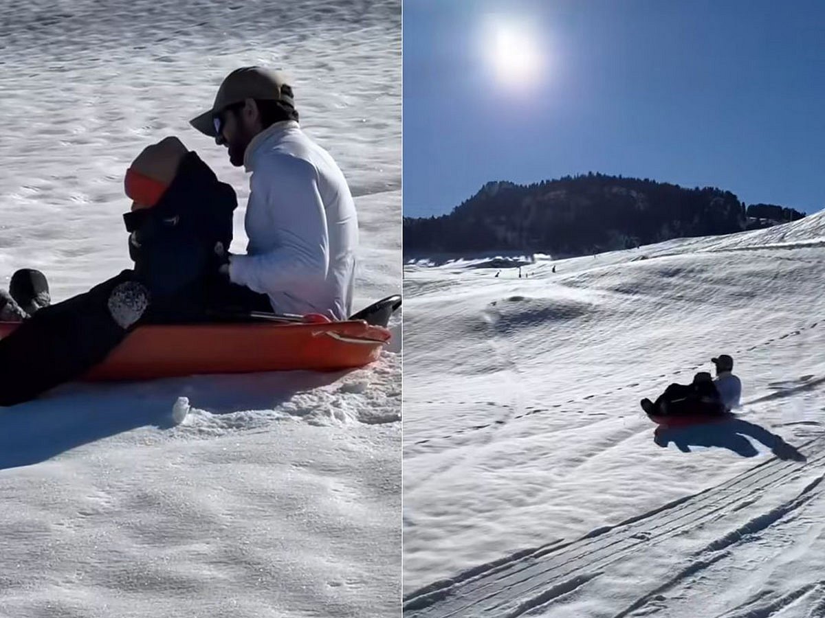 Sheikh Hamdan sledging with his son, at their winter vacation.