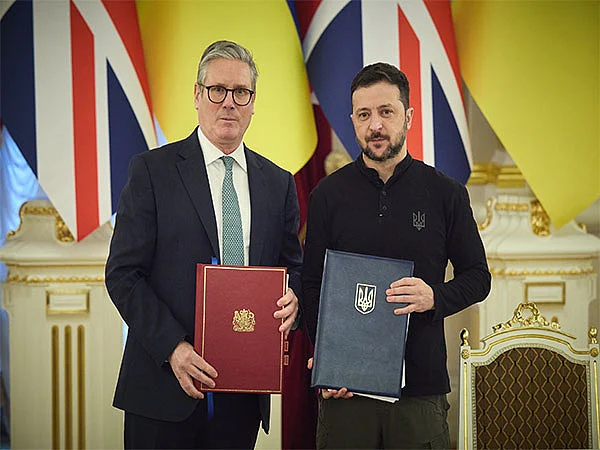 UK PM Keir Starmer and Ukraine President Volodymyr Zelenskyy after signing the 100-year partnership agreement.