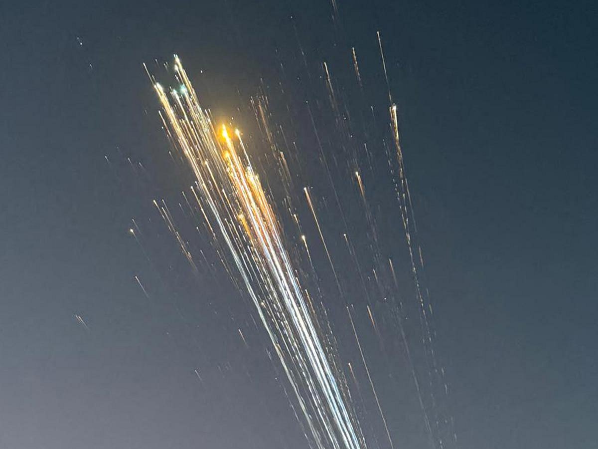 In this handout image courtesy of Greg Blee, debris from the SpaceX Starship is seen in the sky near Providenciales, Turks and Caicos on January 16, 2025. 