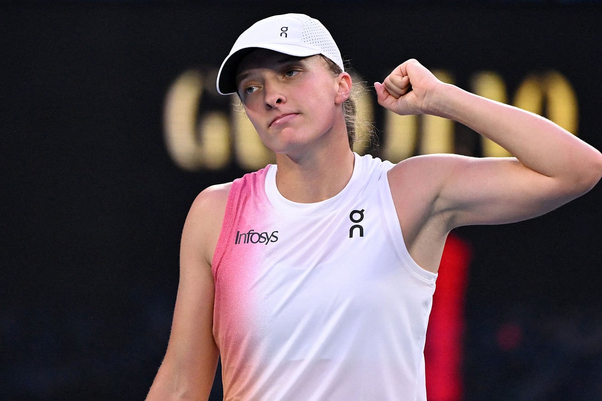 Poland's Iga Swiatek celebrates victory over Germany's Eva Lys after their women's singles match on day nine of the Australian Open tennis tournament in Melbourne on January 20.