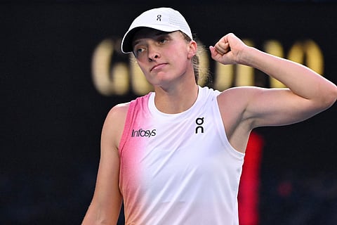 Poland's Iga Swiatek celebrates victory over Germany's Eva Lys after their women's singles match on day nine of the Australian Open tennis tournament in Melbourne on January 20.