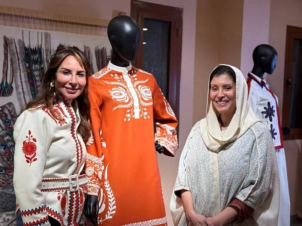 CEO of the Art of Heritage Group Princess Noura Al Faisal with renowned designer Dr. Serra Kirdar at the exhibition.