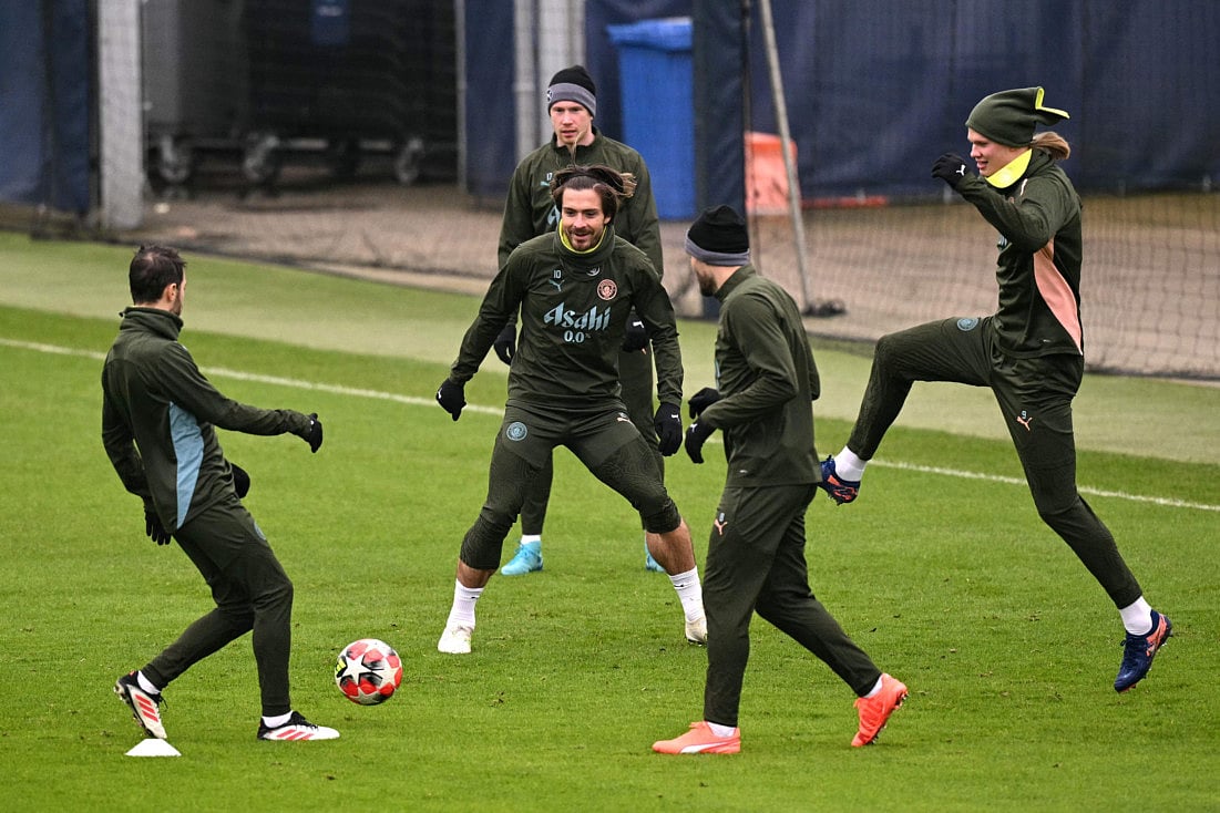 Manchester City's English midfielder Jack Grealish (C) and Norwegian striker Erling Haaland take part in a training session at Manchester City's training ground in Manchester, north-west England, on Wednesday.