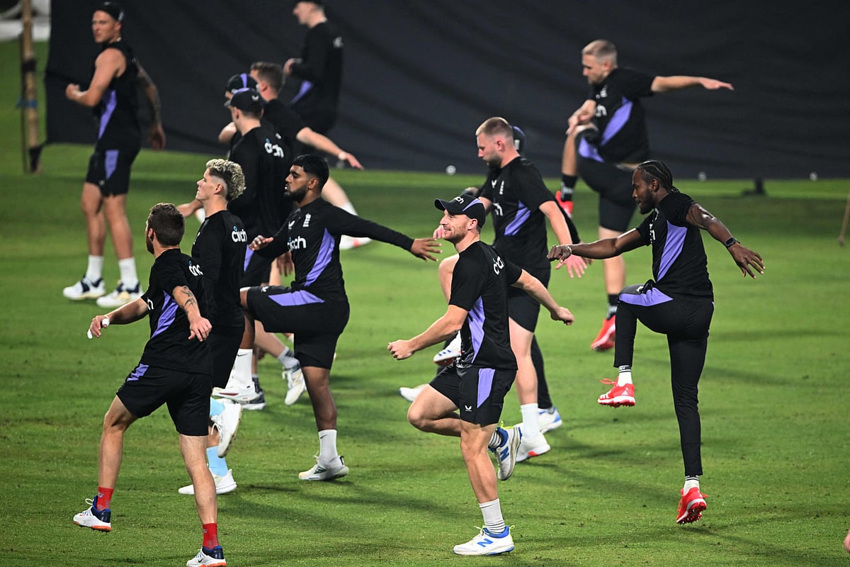 Englands captain Jos Buttler (centre) with other teammates attend a practice session ahead of their first Twenty20 international cricket match against India at the Eden Gardens in Kolkata on January 20.