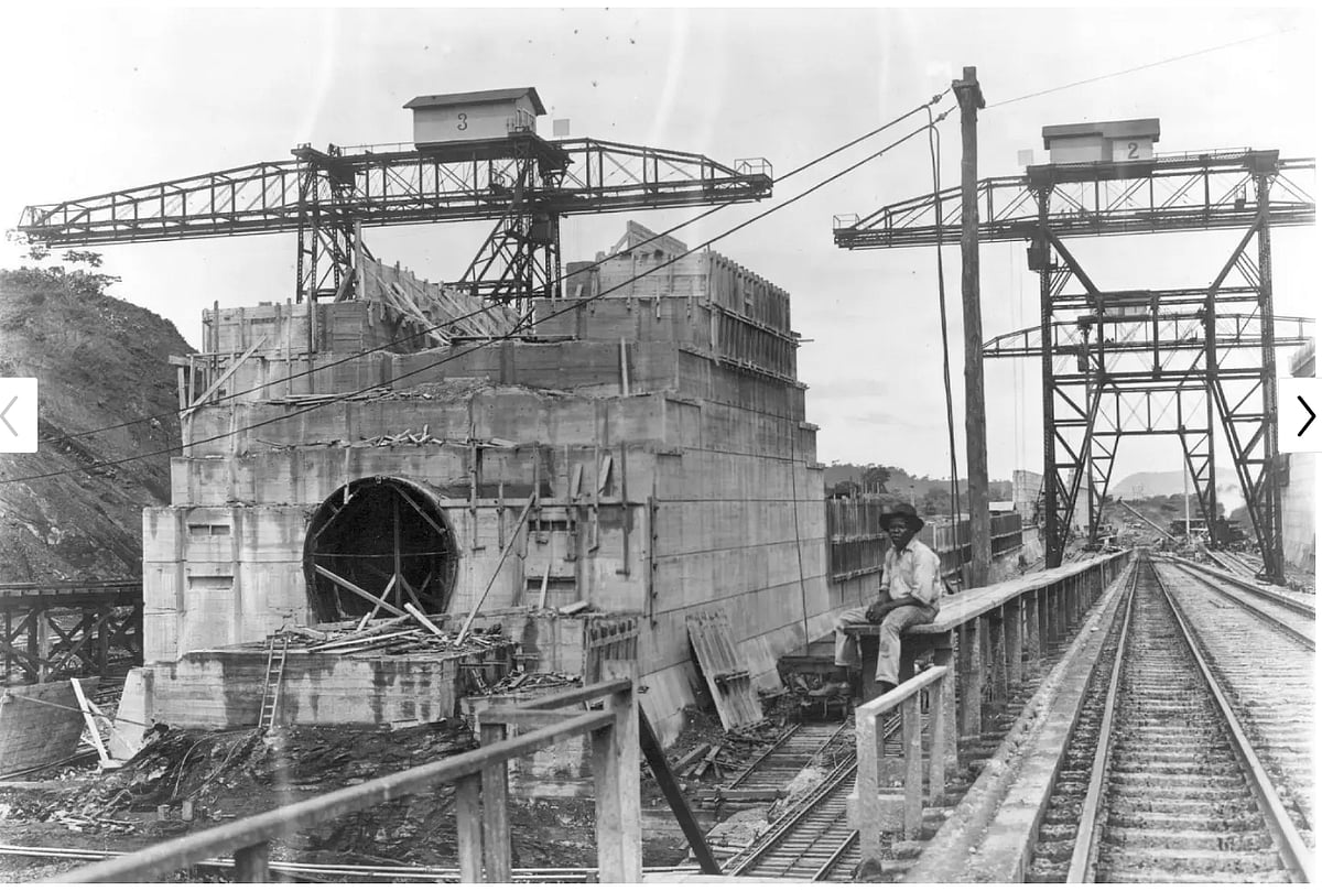 A worker rests in front of the center wall at the Pedro Miguel Locks of the Panama Canal. The canal has three locks: Miraflores and Pedro Miguel on the Pacific side and Gatun on the Atlantic. 
