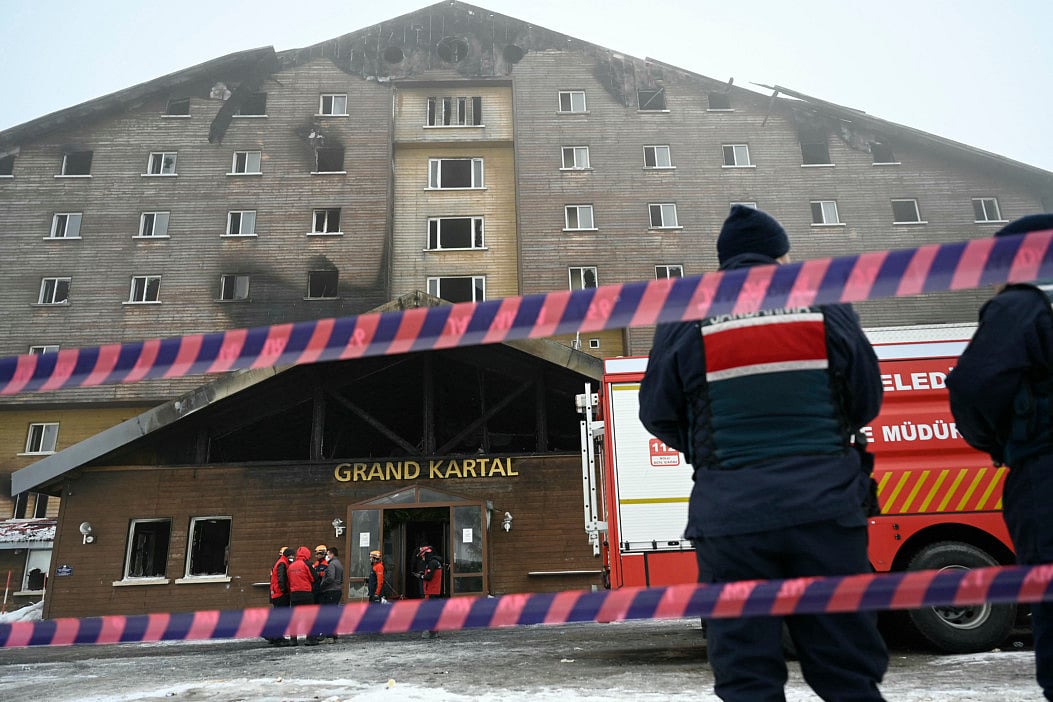Turkish emergency personnel at the hotel hit by fire in the Kartalkaya Ski Resort in Bolu, on January 22, 2025.  