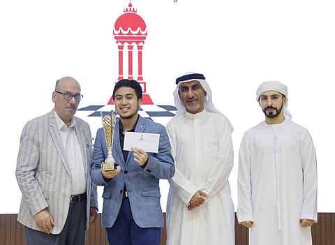 Santiago German (2nd from left) being awarded by (from left to right) Sharjah Cultural and Chess Club Executive Director Ragai Al Susi, UAE Chess Federation Strategic Director His Excellency Waheeb Jaafar Al Zarooni, and Chief Arbiter Salman Al Taher.