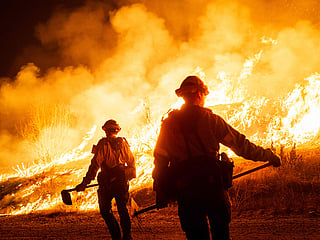 Mass evacuations after explosive new fire erupts near Los Angeles