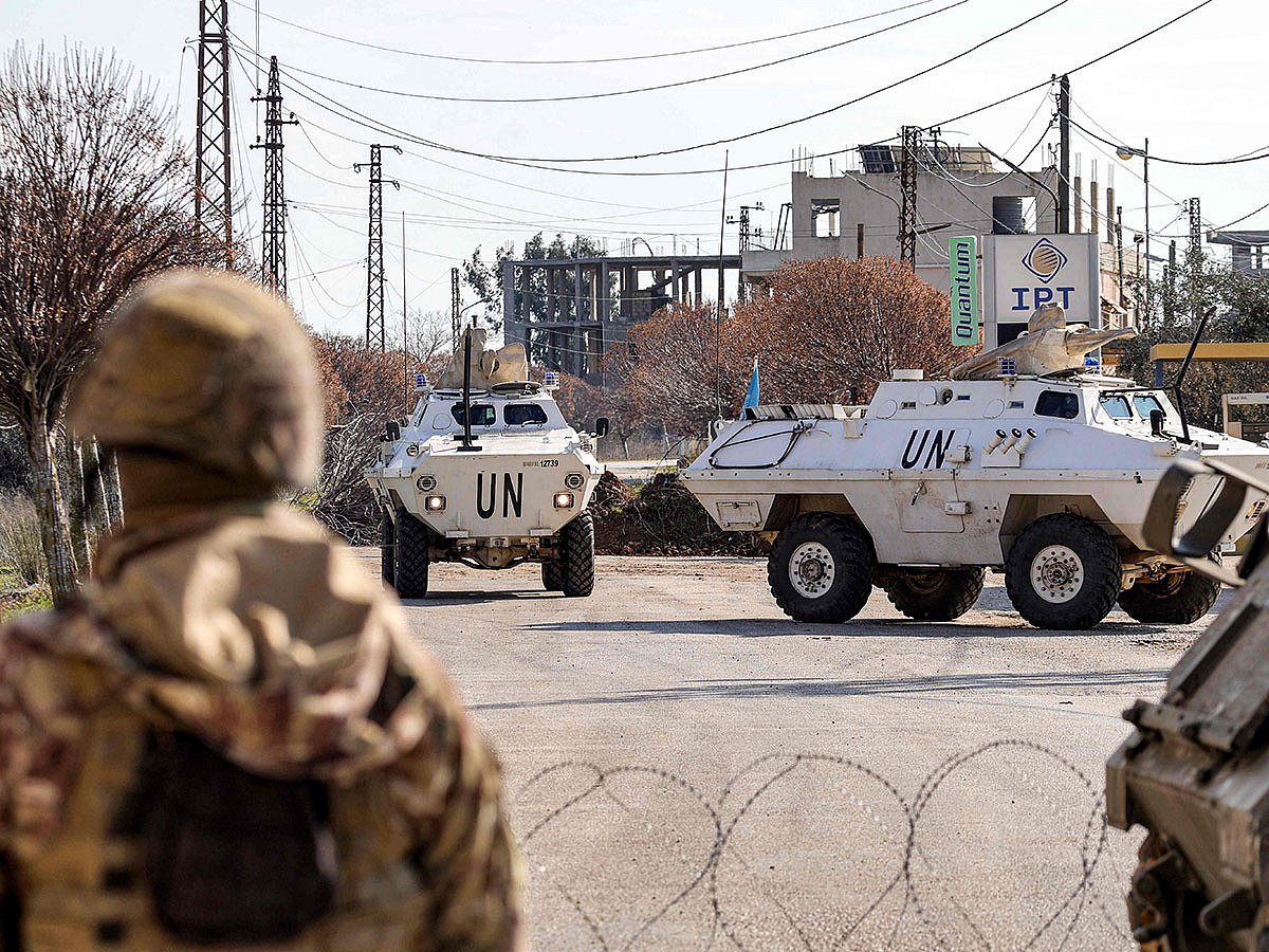 Armoured vehicles of the United Nations Interim Force in Lebanon (UNIFIL) approach a Lebanese army roadblock near a checkpoint in the village of Burj El Meluk in Nabatiyeh in southern Lebanon near the border with Israel.
