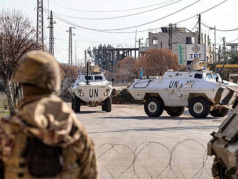 Armoured vehicles of the United Nations Interim Force in Lebanon (UNIFIL) approach a Lebanese army roadblock near a checkpoint in the village of Burj El Meluk in Nabatiyeh in southern Lebanon near the border with Israel.
