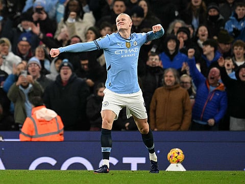 Manchester City's Norwegian striker #09 Erling Haaland celebrates scoring the team's second goal during the English Premier League football match between Manchester City and Chelsea at the Etihad Stadium in Manchester.