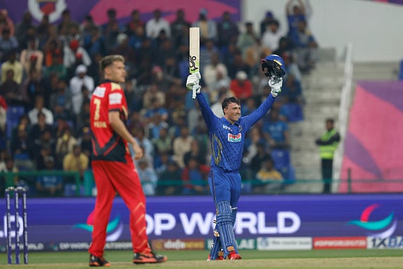 Tom Banton of MI Emirates celebrates after scoring his second century in the DP World ILT20 match against Desert Vipers in Abu Dhabi on Monday.
