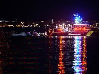 Photos: Rescuers search Potomac river after American Airlines, Black Hawk Army helicopter midair crash