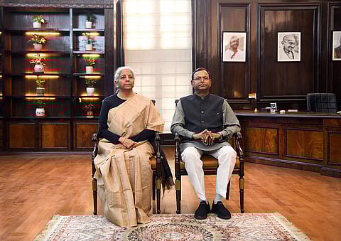Finance Minister Nirmala Sitharaman poses for a picture with MoS Finance Pankaj Choudhary, on the eve of the Union Budget presentation, at Ministry of Finance in New Delhi on Friday.