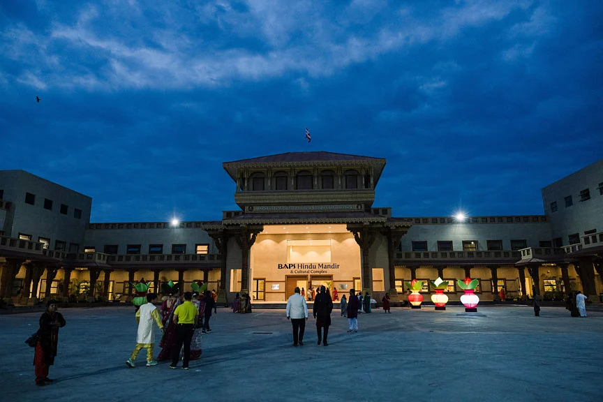 Devotees arrive before sunrise for the consecration ceremony and opening of the first phase of the BAPS (Bochasanwasi Akshar Purushottam Swaminarayan Sanstha) Hindu Mandir in Johannesburg on February 2, 2025.  