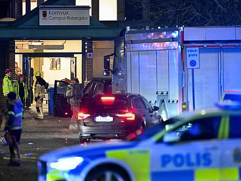 Members of the emergengy services work at the scene of the Risbergska School in Orebro, Sweden, on February 4, 2025, following reports of a serious violent crime. 
