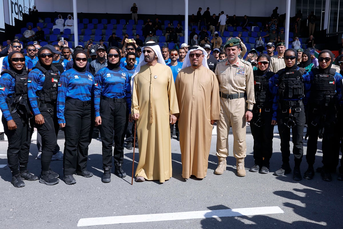 Sheikh Mohammed bin Rashid Al Maktoum with Dubai Police Women Swat team during his visit to the UAE Swat Challenge 2025 competitions in Dubai on Tuesday.