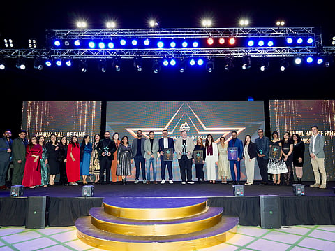 RAKEZ team with awardees at the Hall of Fame event 