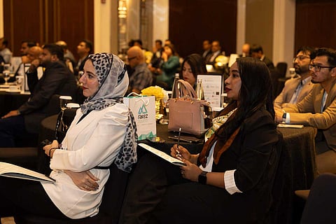 Speakers listening to experts at the Invest UAE seminar 