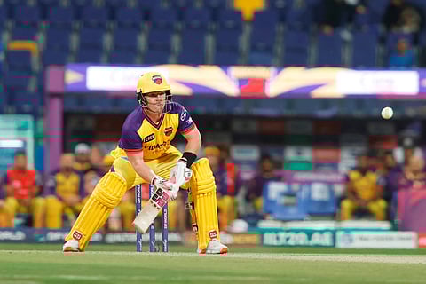 Sharjah Warriorz Tim Seifert prepares for a scoop shot during the match against MI Emirates at the Sheikh Zayed Stadium in Abu Dhabi on Thursday.