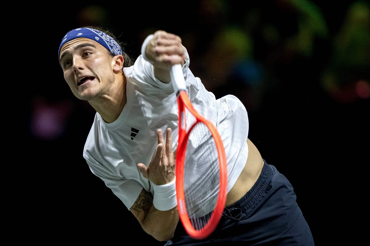 Italy's Mattia Bellucci returns a shot against Russia's Daniil Medvedev on the third day of the ATP500 Rotterdam Open tennis tournament at the Ahoy venue in Rotterdam, on February 5.