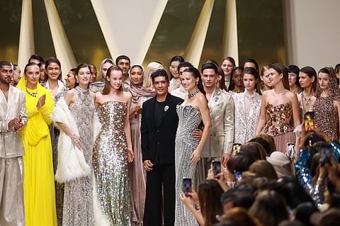 Manish Malhotra with Brazilian model Adriana Lima who was a show stopper at his Dubai Fashion Week grand Finale 