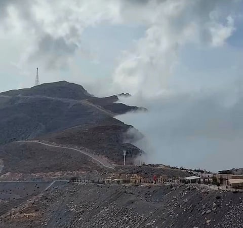 Weather update: Dust alert in Abu Dhabi, partly cloudy skies, chance of rain in some parts of the UAE