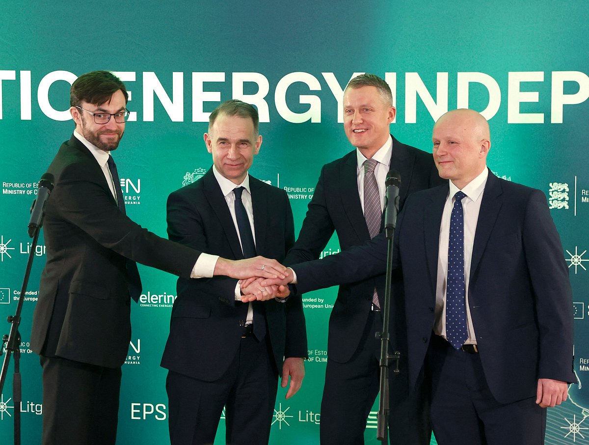 Litgrid System Management Department Head Donatas Matelionis, head of Lithuanian electricity transmission system operator Litgrid Rokas Masiulis, Lithuanian Minister of Energy Zygimantas Vaiciunas and state-owned group of energy transmission and exchange companies EPSO-G Head Mindaugas Keizeris pose during a press conference on the disconnection of the Baltic States from the IPS / UPS electricity grid system in Vilnius, Lithuania, on February 8, 2025.