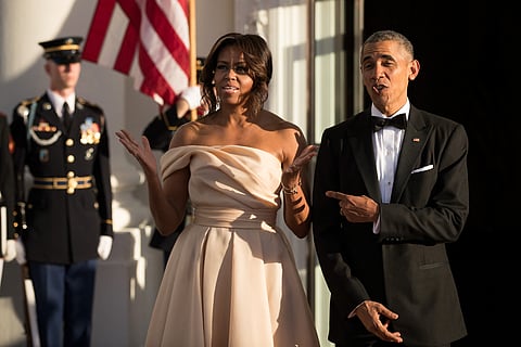 First Lady Michelle Obama and U.S. President Barack Obama wait for leaders to arrive for the Nordic state dinner on the North Portico at the White House, May 13, 2016, in Washington, DC.