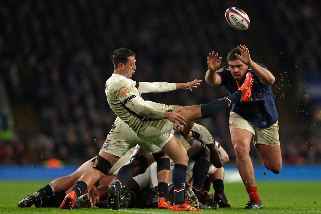 England's scrum-half Alex Mitchell kicks the ball up-field during the Six Nations international rugby union match against France at Allianz Stadium, Twickenham, in south-west London, on February 8.