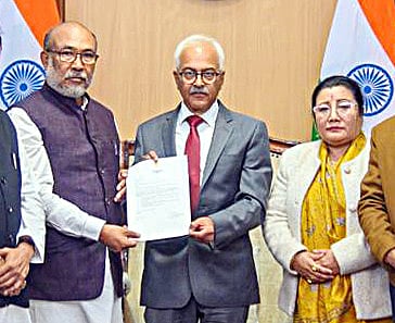 Manipur CM N Biren Singh hands over the letter of resignation from the post of Chief Minister to Governor Ajay Kumar Bhalla, at Raj Bhavan in Imphal on Sunday. 
