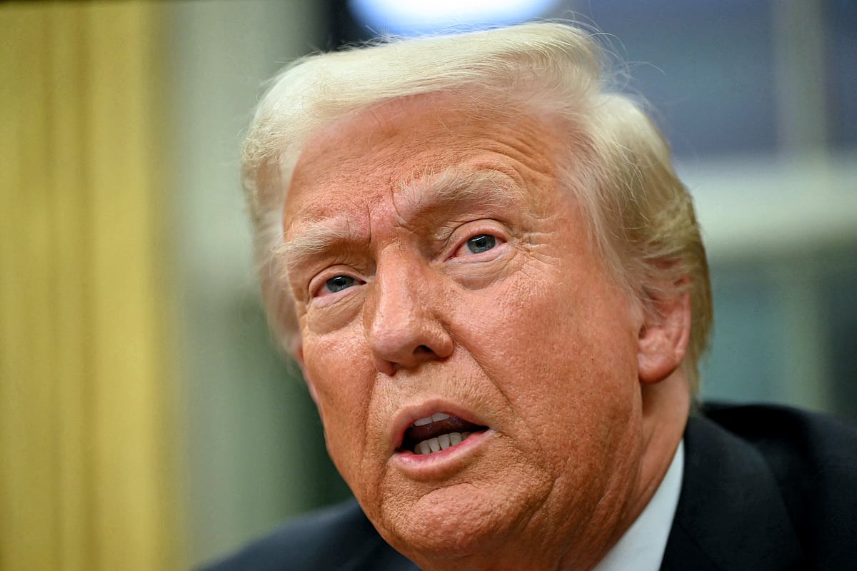 US President Donald Trump speaks to the press after signing an executive order in the Oval Office of the White House in Washington, DC, on February 10, 2025.