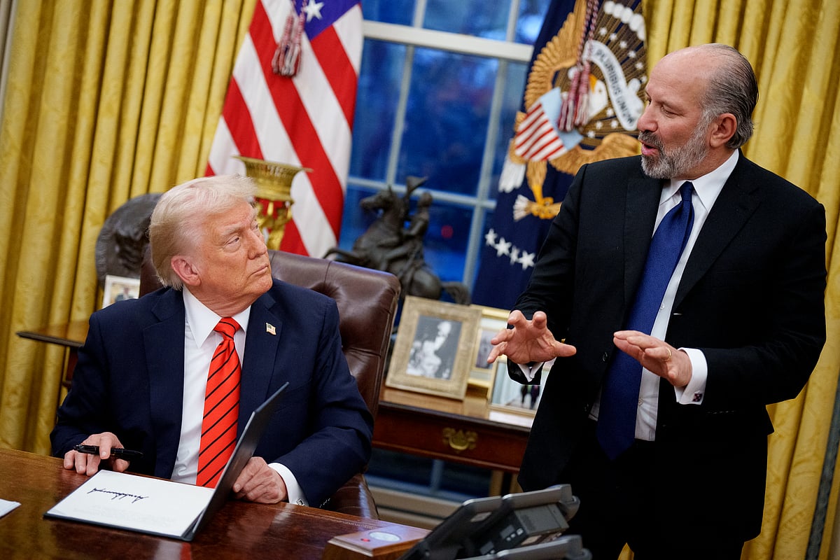 US Commerce Secretary nominee Howard Lutnick speaks as US President Donald Trump signs a series of executive orders including 25% tariffs on steel and aluminum, a pardon for former Illinois Governor.