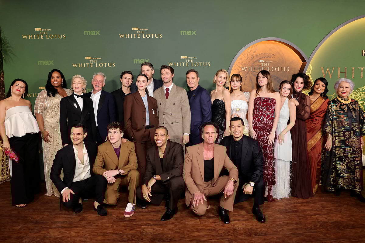 Morgana O'Reilly, Natasha Rothwell, Julian Kostov, Carrie Coon, Mike White, Sam Nivola, Arnas Fedaravičius, Charlotte Le Bon, David Bernad, Nicholas Duvernay, Patrick Schwarzenegger, Jason Isaacs, Walton Goggins, Leslie Bibb, Tayme Thapthimthong, Lisa, Aimee Lou Wood, Sarah Catherine Hook, Parker Posey, Shalini Peiris and Lek Patravadi attend the Los Angeles Premiere of HBO Original Series "The White Lotus" Season 3 at Paramount Theatre on February 10, 2025 in Los Angeles, California.