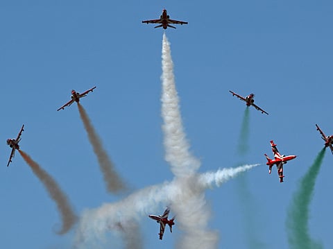 The Indian Air Force (IAF) Surya Kiran aerobatics team performs during Aero India 2025, a military aviation exhibition at the Yelahanka Air Force Station in Bengaluru on February 12, 2025.