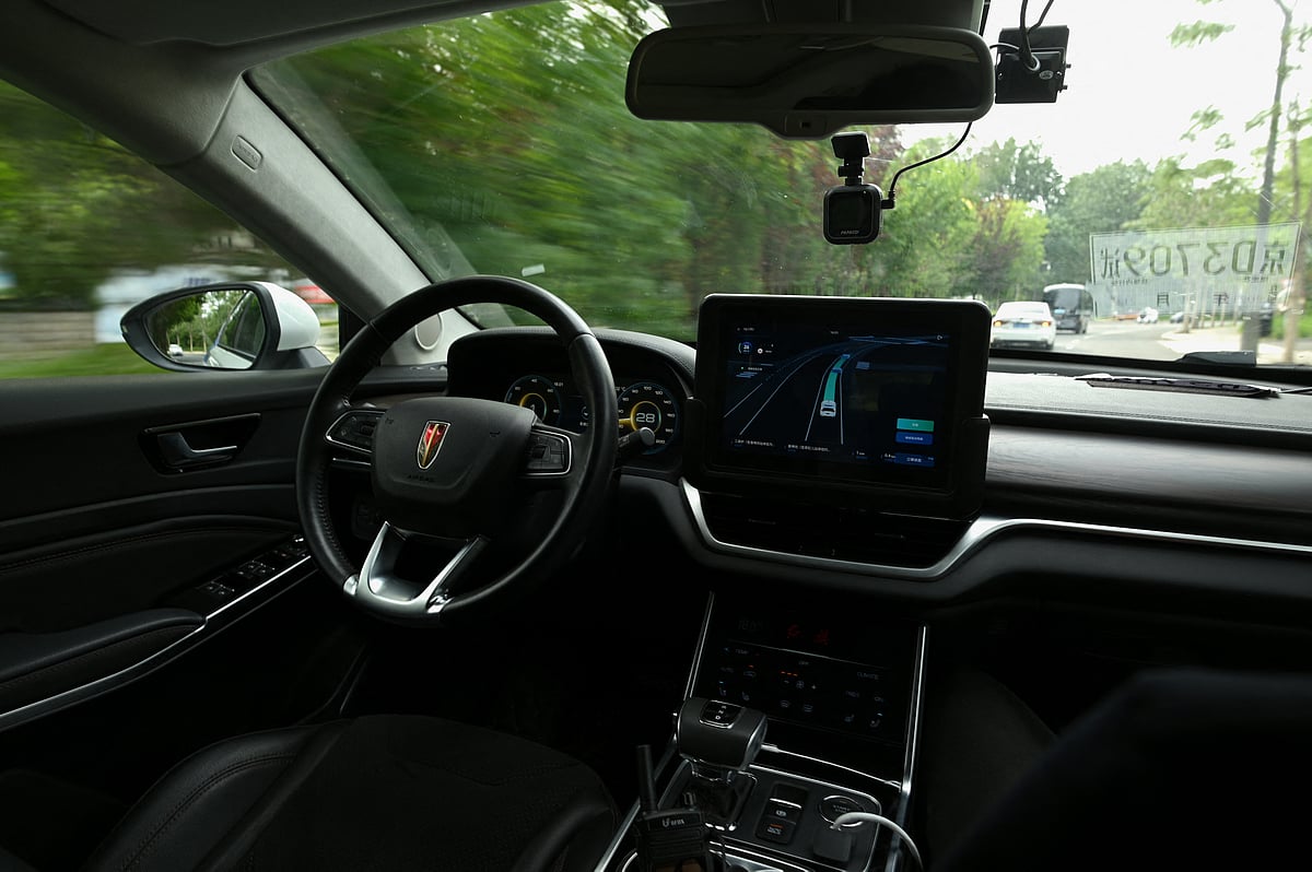 View from inside an Apollo Robotaxi, a paid driverless taxi service by Chinese tech giant Baidu, which drives at the Shougang Park, on July 2, 2021 in Beijing.
