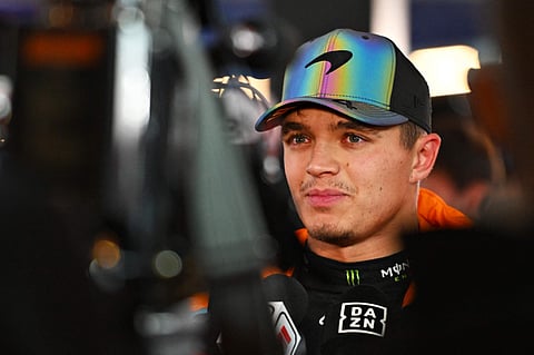 Sixth placed qualifier Lando Norris of Great Britain and McLaren talks to the media in the Paddock during qualifying ahead of the F1 Grand Prix of Las Vegas at Las Vegas Strip Circuit on November 22, 2024.