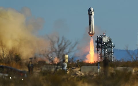 A Blue Origin New Shepard rocket launches from Launch Site One in West Texas north of Van Horn on March 31, 2022.