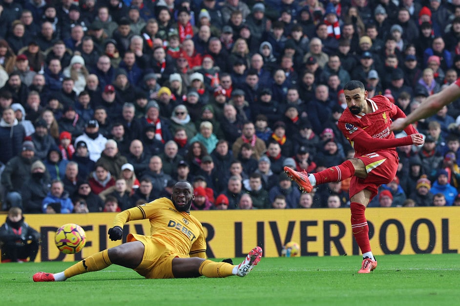 Liverpool's Egyptian striker Mohamed Salah (right) scores but sees it disallowed for offside during the English Premier League football match against Wolverhampton Wanderers at Anfield in Liverpool, north west England on February 16.