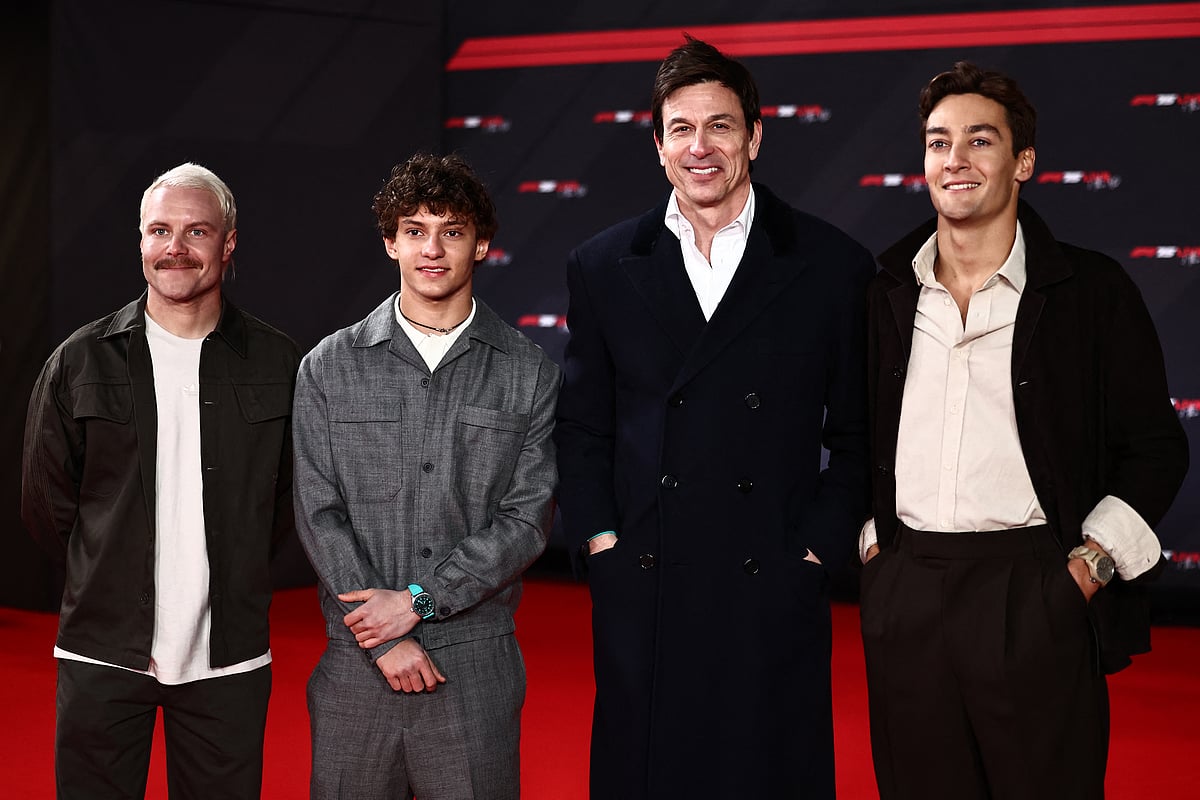 Mercedes' Finish driver Valtteri Bottas, Mercedes' Italian driver Andrea Kimi Antonelli, Mercedes' Austrian team principal Toto Wolff and Mercedes' British driver George Russell pose on the red carpet upon arrival for the Formula One - 2025 season launch “F1 75 LIVE” event at the O2, in London, on February 18.