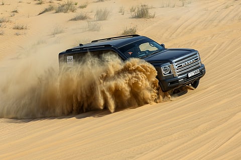 GWM Hawal H9 conquering the dunes during the 43rd Gulf News Overnighter Fun Drive. 