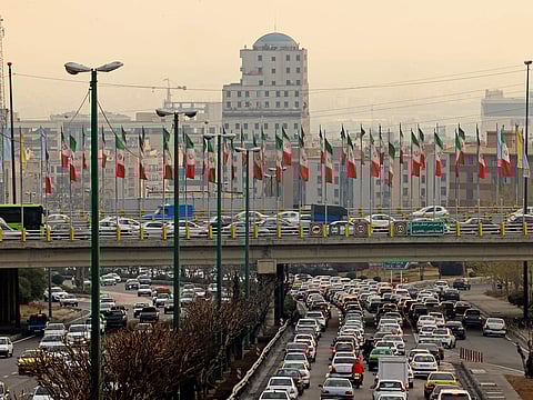Traffic flows through a congested highway in Tehran on January 18, 2025. 