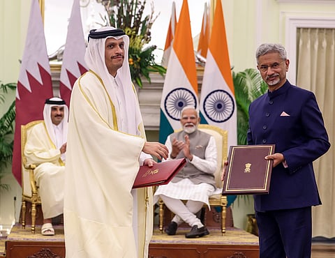 Prime Minister Narendra Modi with Sheikh Tamim Bin Hamad Al Thani, witness the signing of agreements between  External Affairs Minister S Jaishankar and Qatar's Prime Minister and Minister of Foreign Affairs Sheikh Mohammed bin Abdulrahman bin Jassim Al Thani, at Hyderabad House in New Delhi on Tuesday.  