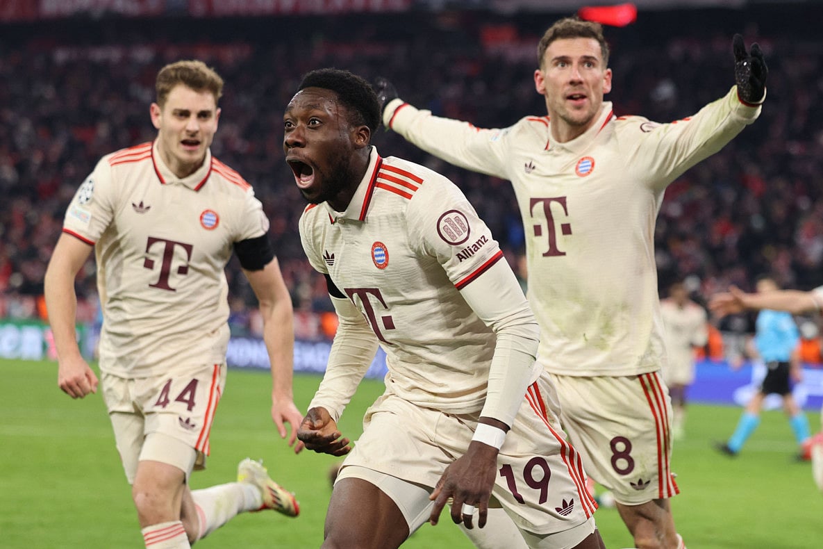 Bayern Munich's Canadian defender Alphonso Davies celebrates with Croatian defender Josip Stanisic and German midfielder Leon Goretzka after scoring the equalising goal during the Uefa Champions League second-leg, knockout phase play-off match against Celtic on February 18.