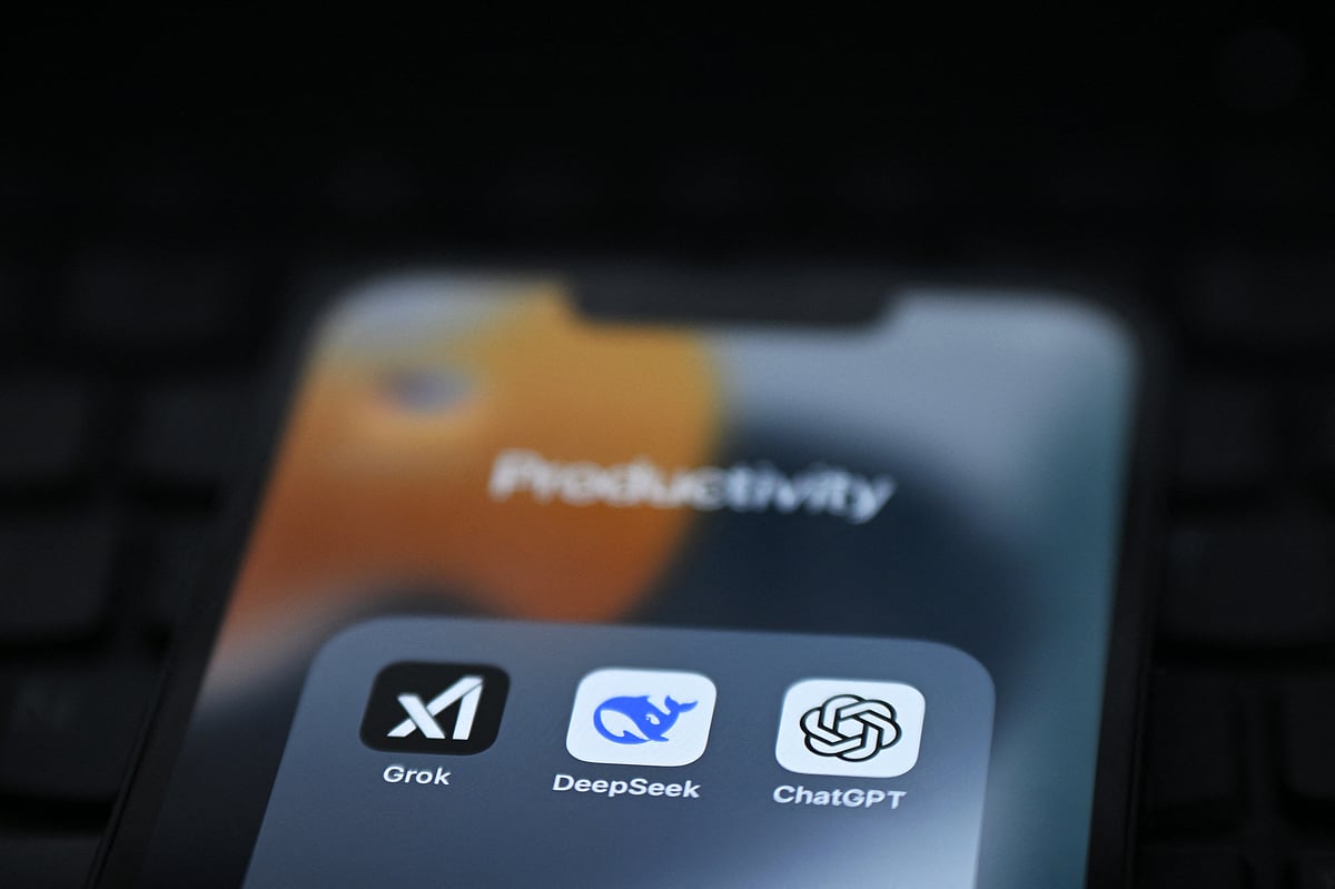 An illustration photograph taken on February 19, 2025 shows Grok, DeepSeek and ChatGPT apps displayed on a phone screen.