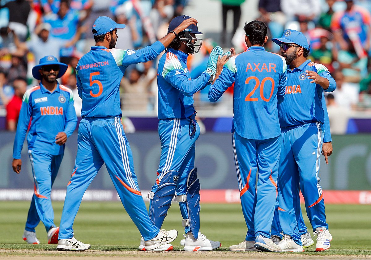 India's captain Rohit Sharma along with teammate KL Rahul discuss for a review during the match against Bangladesh in the ICC Champions Trophy at Dubai International Cricket Stadium in Dubai on Thursday.