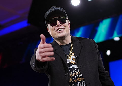 Elon Musk, the billionaire advisor to Donald Trump, said Saturday that all US federal employees must justify their work or lose their jobs, hours after the president pushed him to be "more aggressive" in slashing government spending.