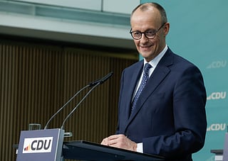 German vote winner Merz seeks to build government as Europe waits