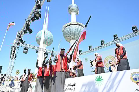 Kuwaitis celebrate the National Day. 